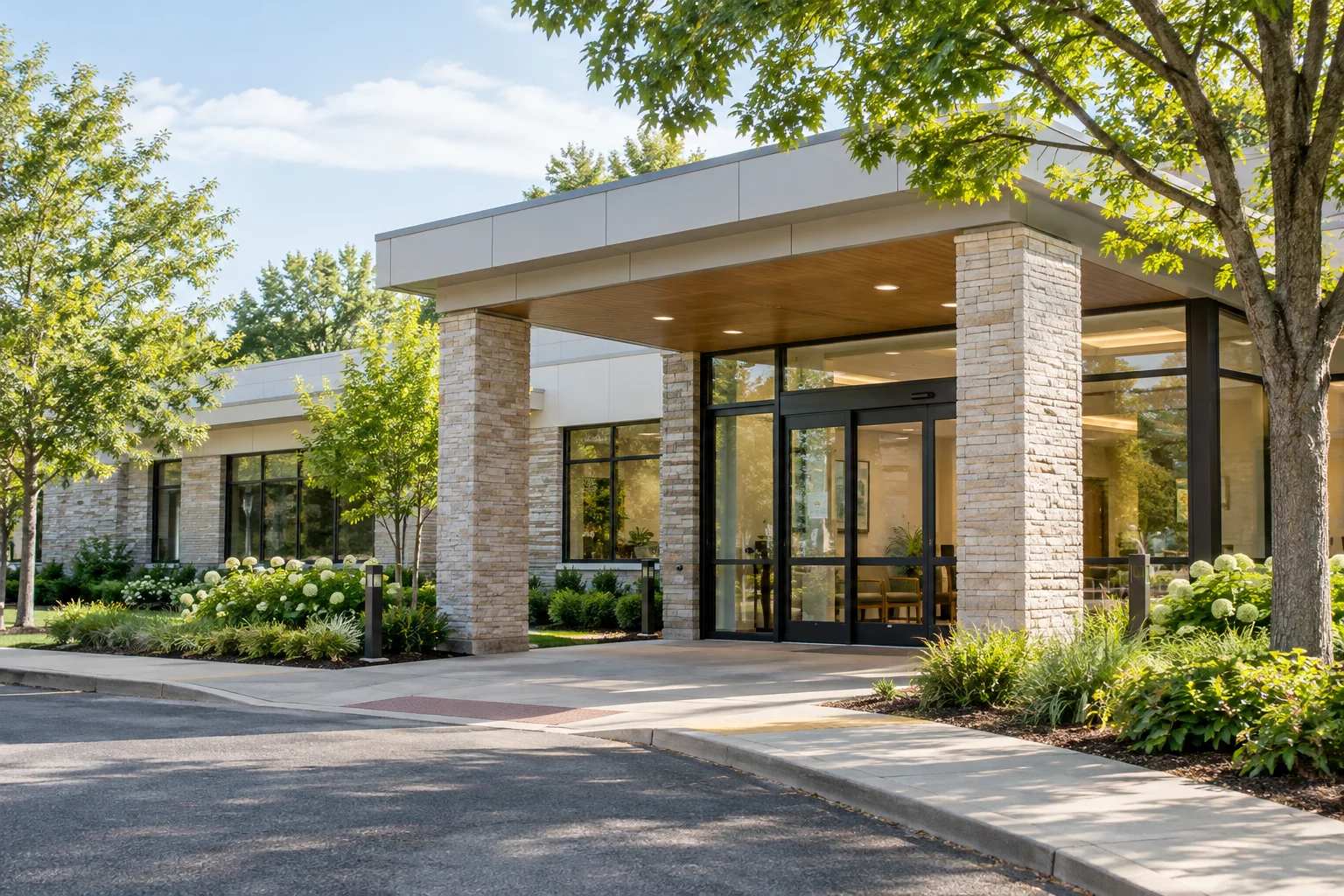Medical-office exterior with maintained green landscaping.
