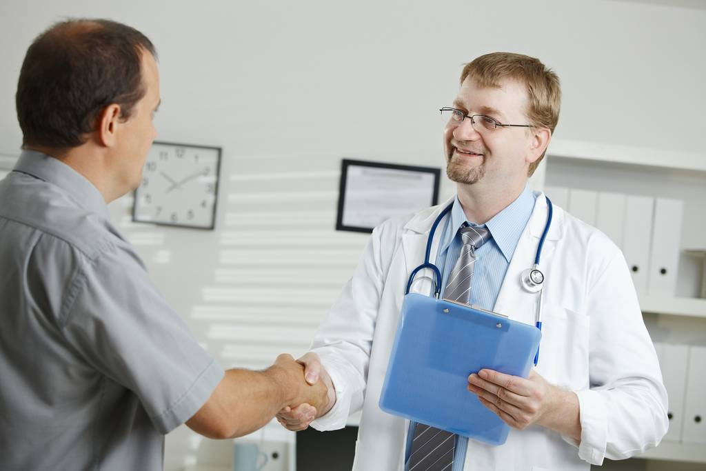 Doctor greeting patient