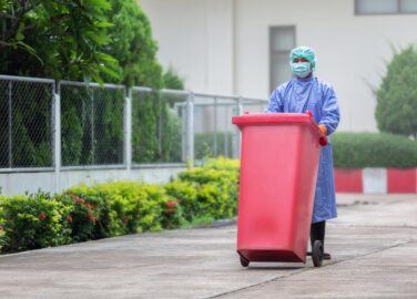 Office Manager Disposing Medical Waste